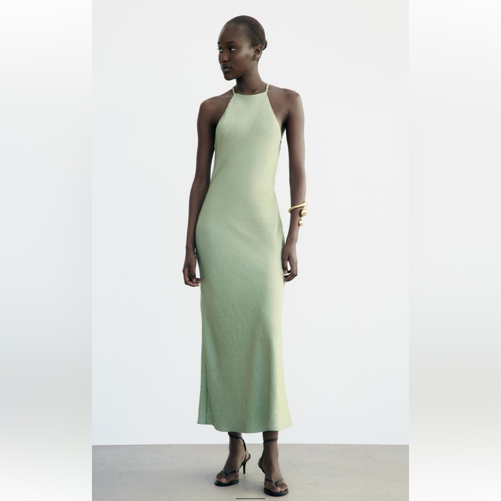 Halter top dress with thin straps and beaded appliqués